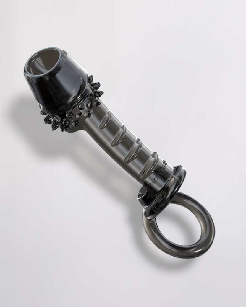 Metallic object with decorative elements on a white background