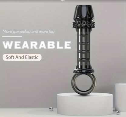 Black and gray wearable device on a white platform with a light gray background