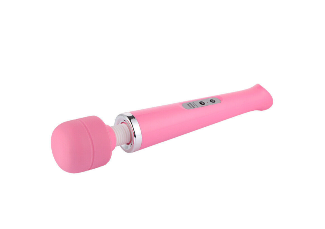 Pink microphone on a white background